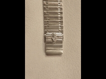 コルム　Pt950・ダイヤ時計　　（USED)