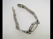 ﾎﾞ-ﾑ&ﾒﾙｼｪ　K18WGシェルダイヤベゼル・サファイア時計（USED)